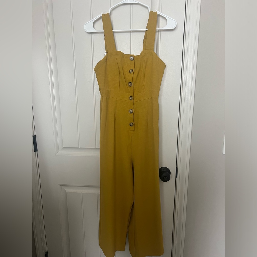 Mustard colored jumpsuit from the Buckle.